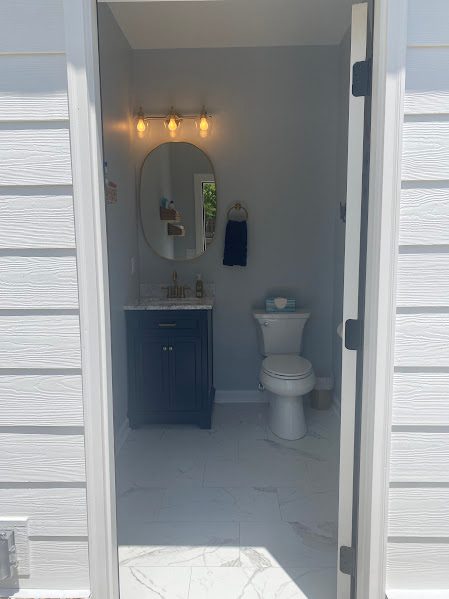 The Cypress Quarters — Half bath · Outside